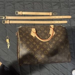 authentic Louis Vuitton speedy 35 bandoleer. incredibly beautiful bag that needs